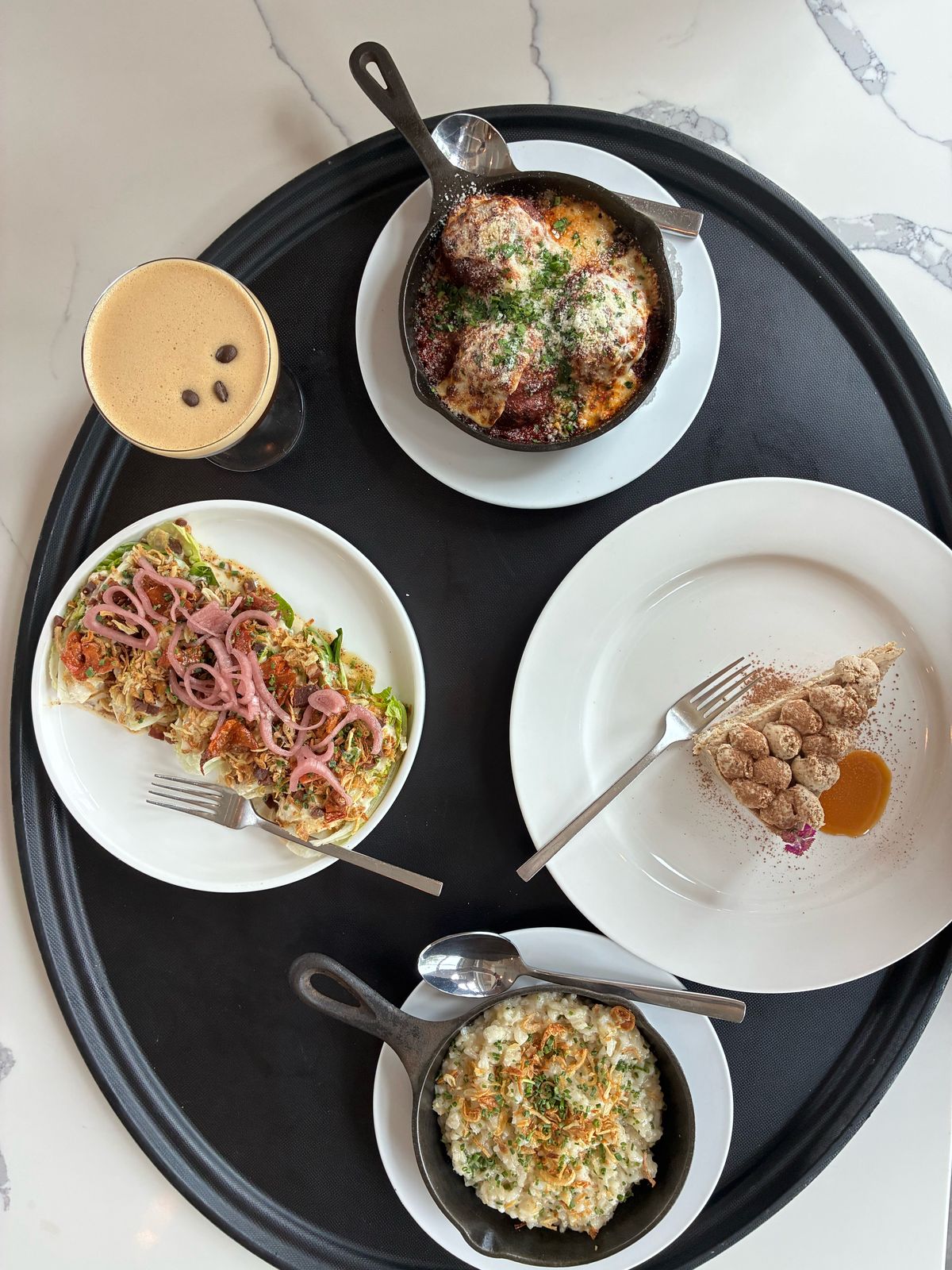 Skillet spread with salad and dessert